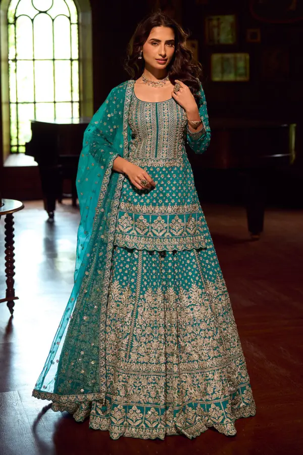 Teal blue mirror work kurti lehenga with front and back hand embroidery by Khaish