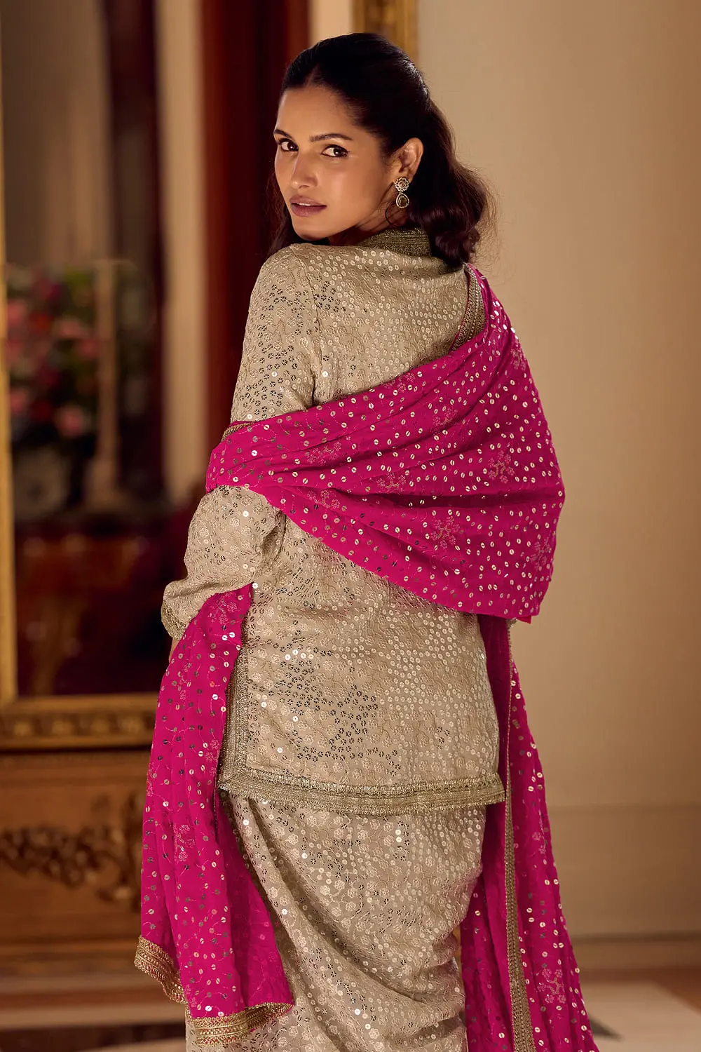 Detailed close-up of heavy hand work embroidery on premium georgette dhoti suit with dupatta bodice.