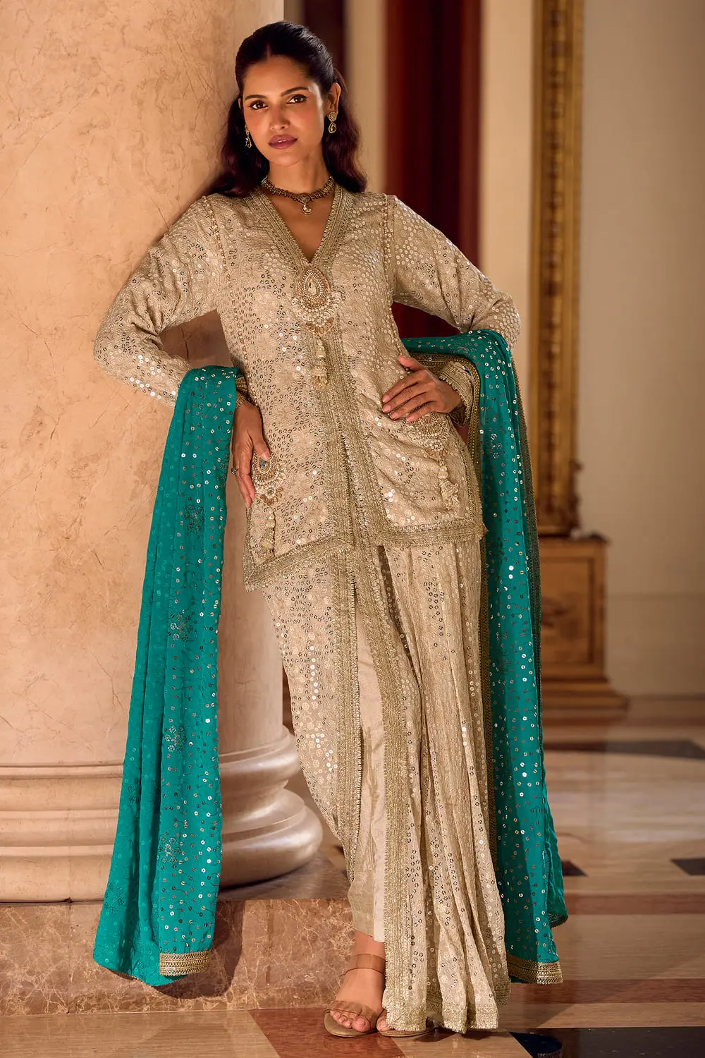 Regal Beige Hand-Work Dhoti Suit With Heavy Teal Blue Dupatta Regal Beige Hand-Work Dhoti Suit With Heavy Teal Blue Dupatta
