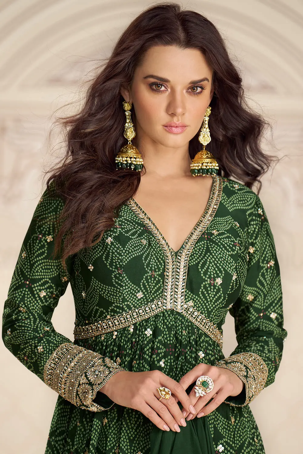 Close up of digital bandhani print and embroidery on green anarkali gown