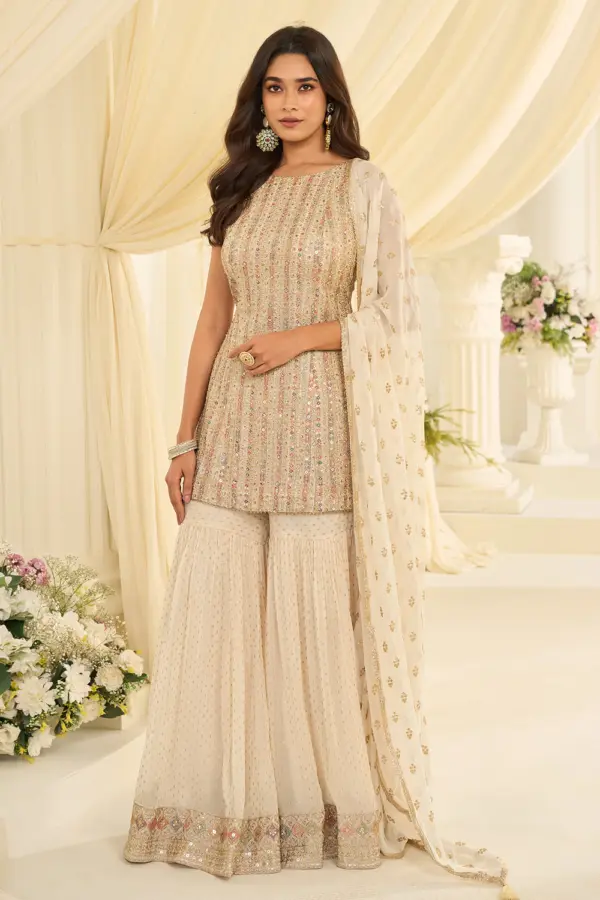 Ivory gharara set for reception in premium georgette with stone work by Khaish