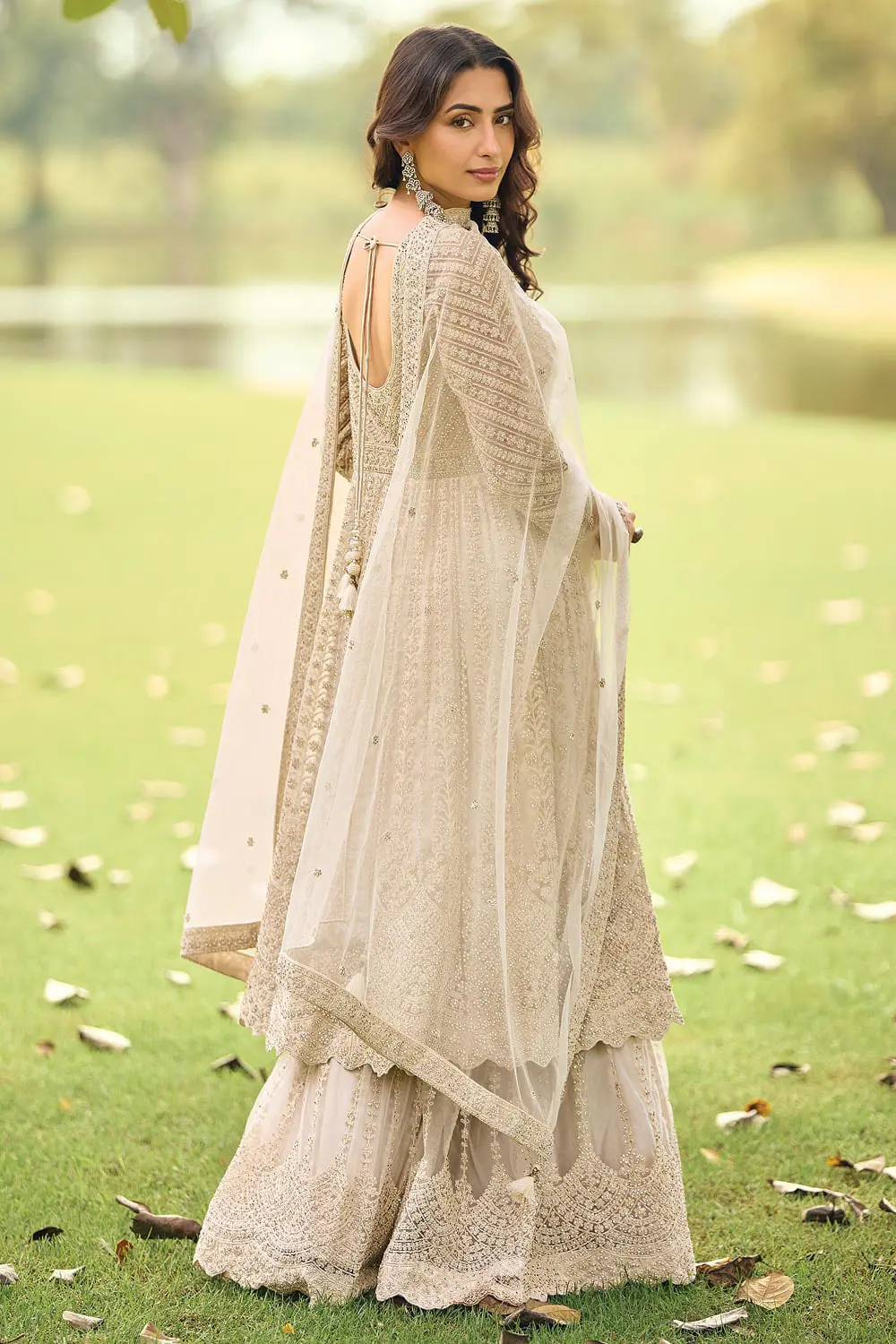 Back view of beige net kurta top showing full back beads embroidery coverage