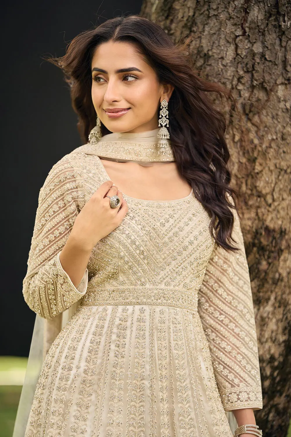 Close up of heavy beads embroidery on beige net palazzo and dupatta detail