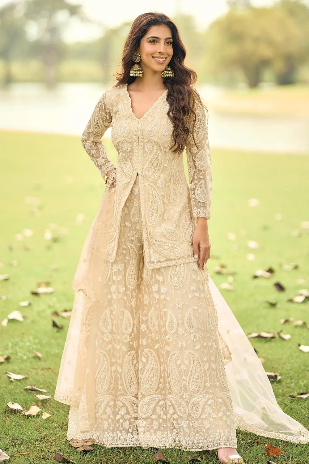 Light gold net palazzo set for wedding with beads embroidery and diamond work by Khaish