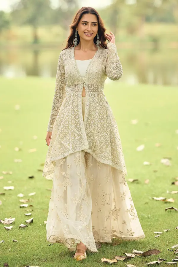 Ivory net kurta palazzo set for reception with beads embroidery and diamond work by Khaish