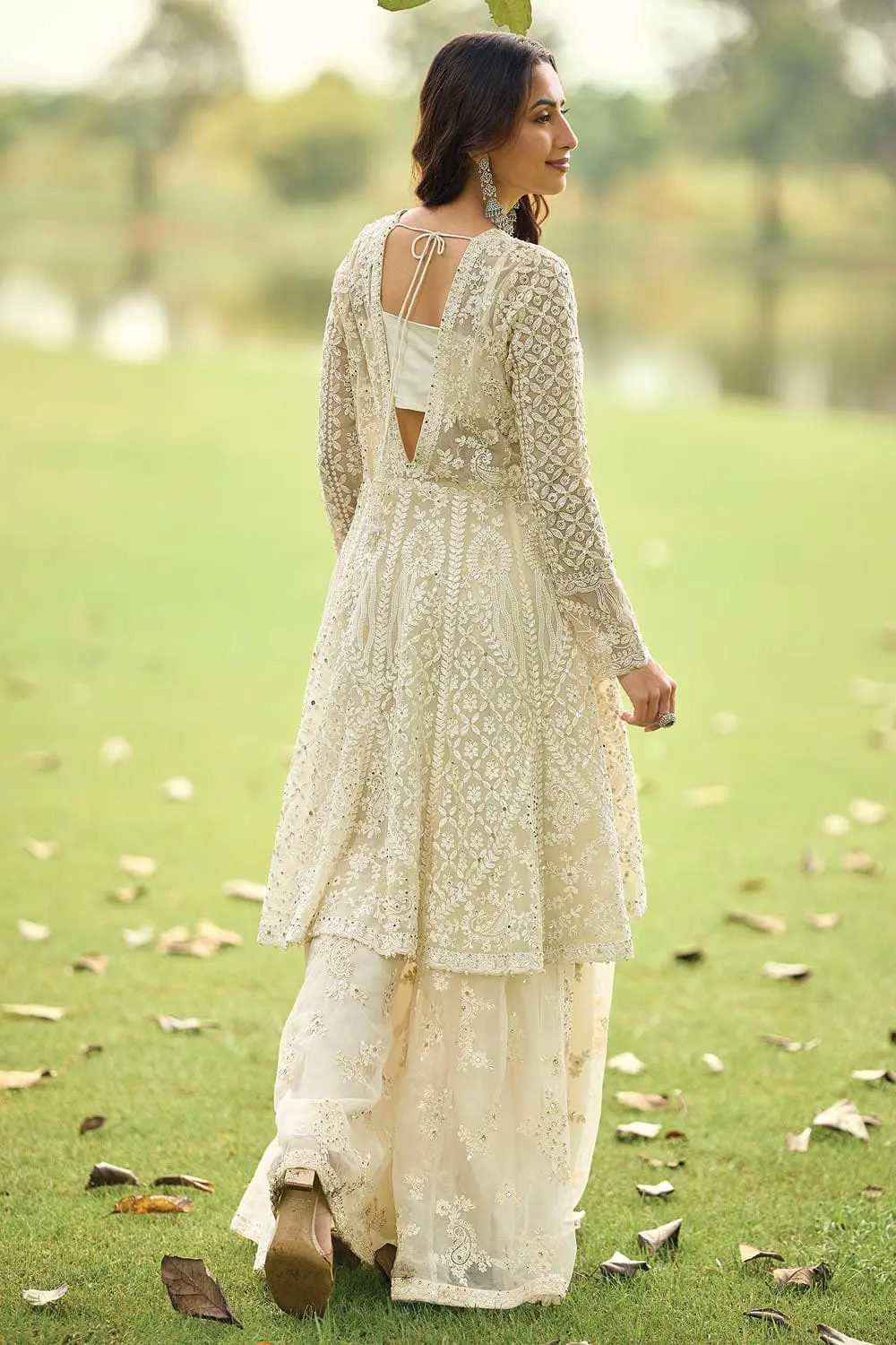 Second front view of ivory premium net palazzo set, full length bead embroidery visible