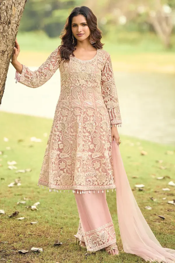 Dusty pink net palazzo set for sangeet with beads embroidery and diamond work by Khaish