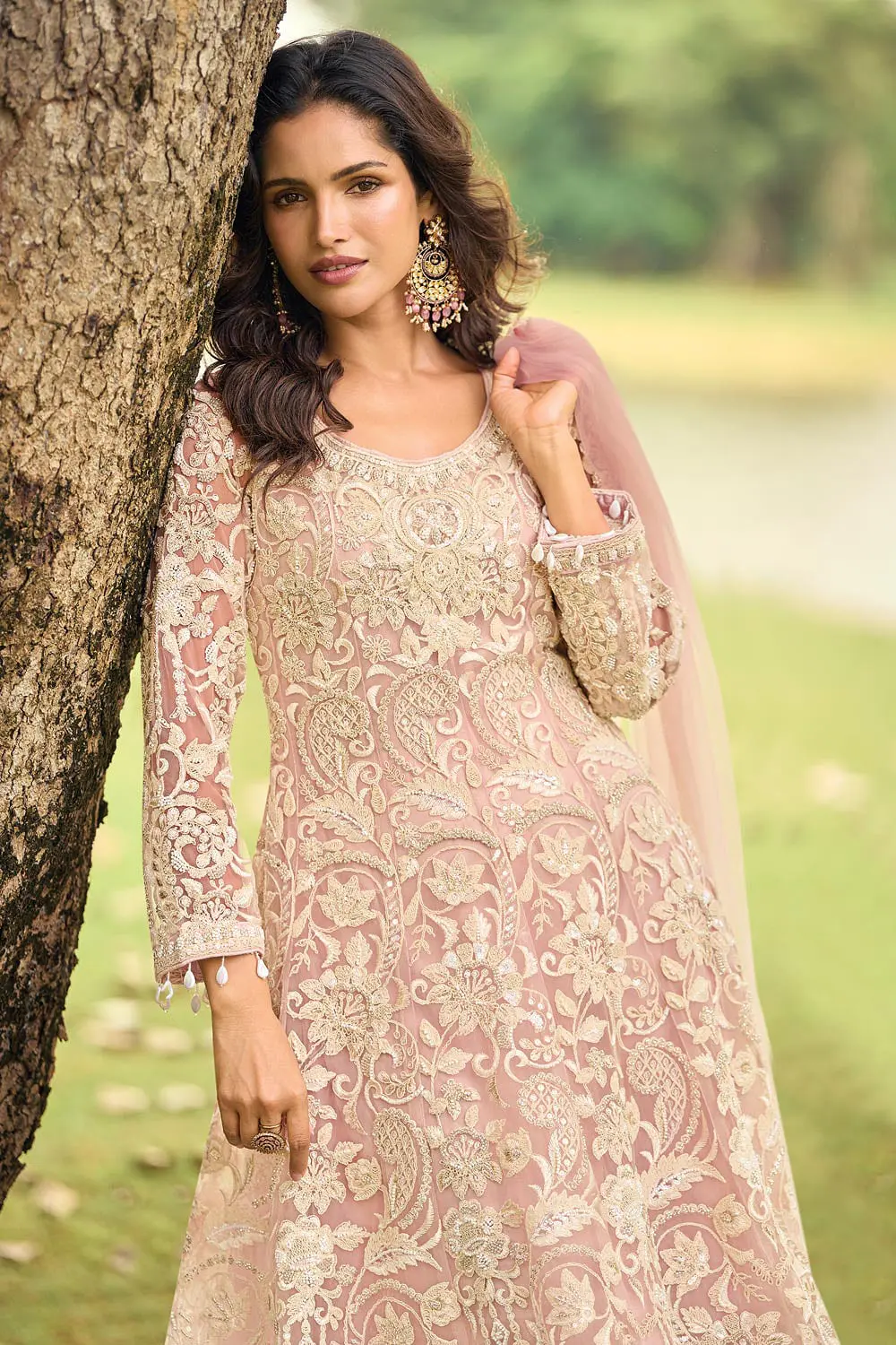 Close up of dusty pink net dupatta with beads work detail