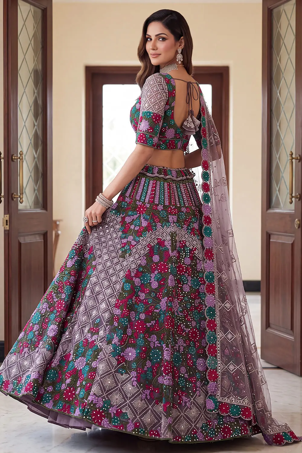 Back view of purple multicolor floral handwork lehenga with softnet dupatta