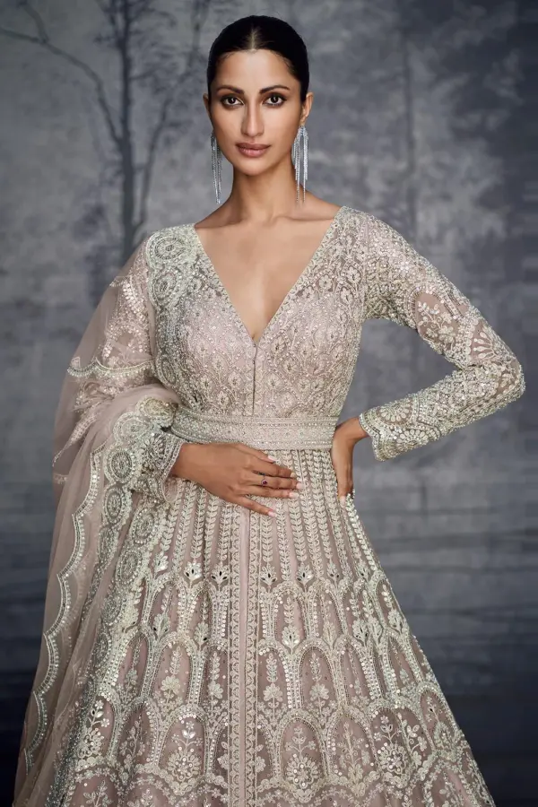 Close up of hand moti and Swarovski diamond work on dusty pink net anarkali
