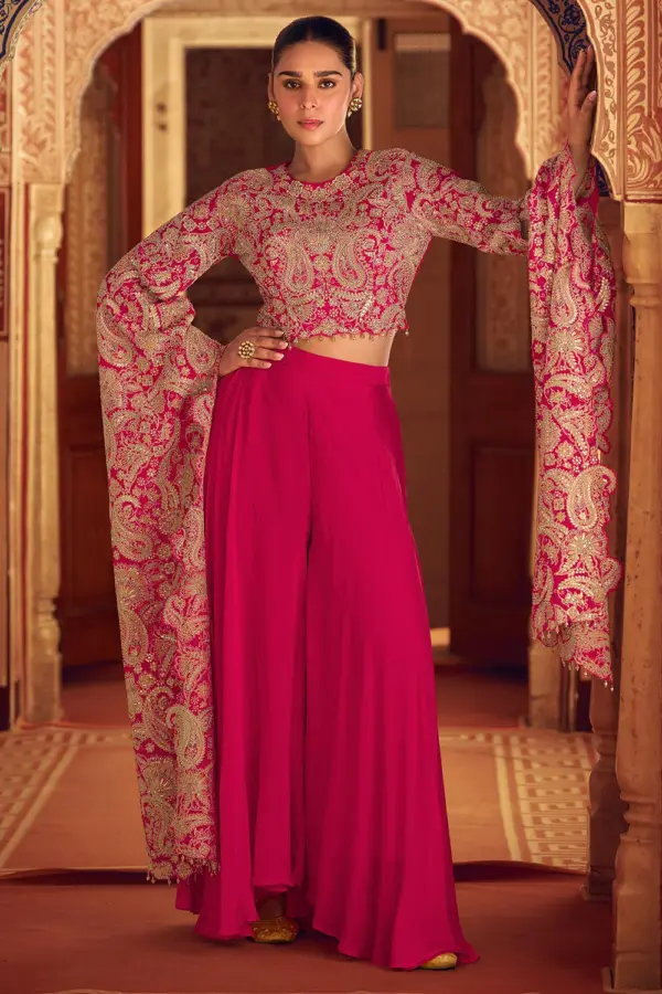 Stunning pink Indo western crop top with palazzo featuring heavy zari embroidery