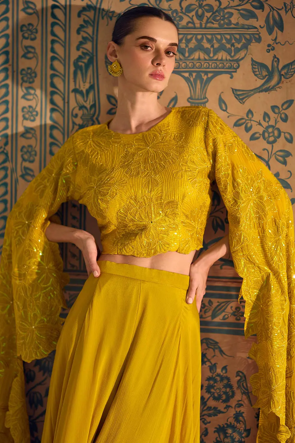 Close up of zari embroidery on mustard chinon silk crop top