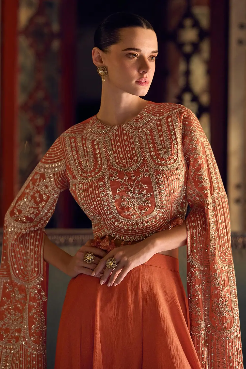 Detailed long sleeve construction featuring a single pearl accent and zari embroidery