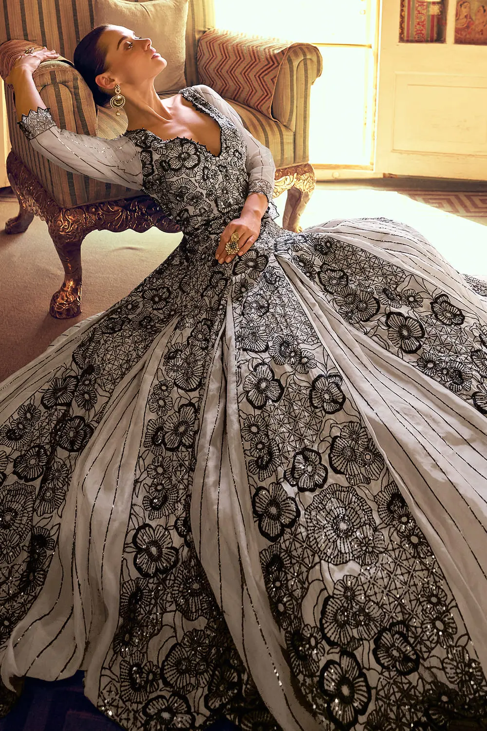 Macro close up highlighting the intricate thread work on the premium silk fabric.