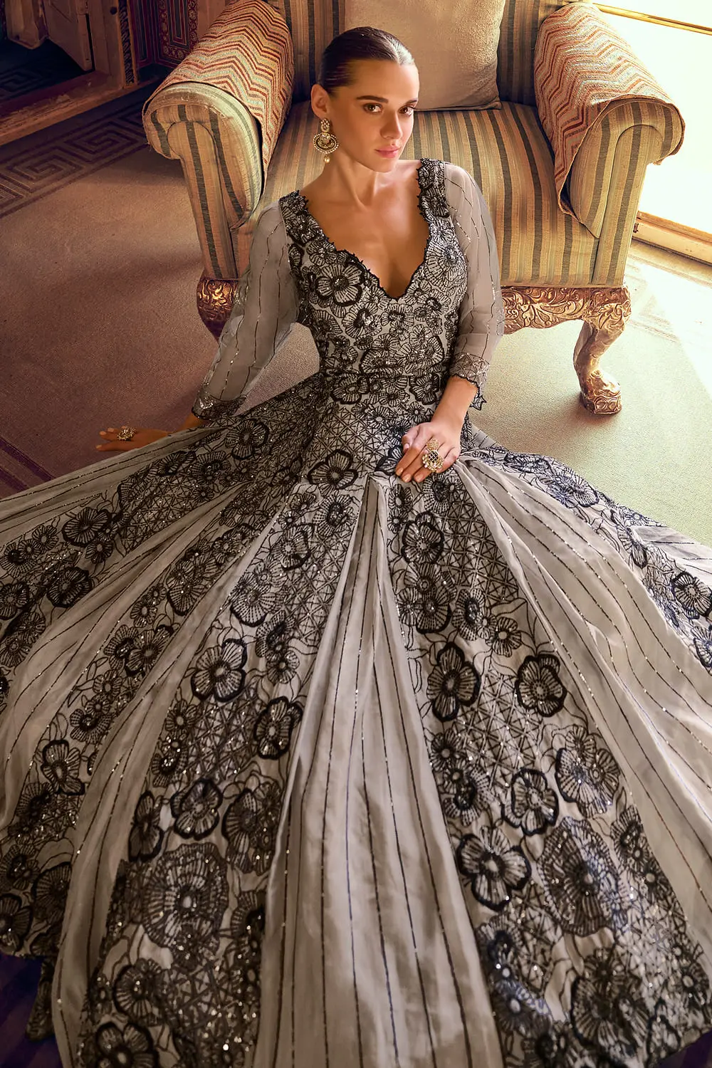 Detailed close up of the beautiful embellishments on this contemporary grey fusion gown.