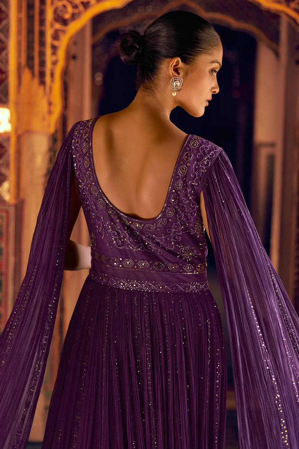 Beautiful neckline design on the plum georgette indowestern anarkali gown