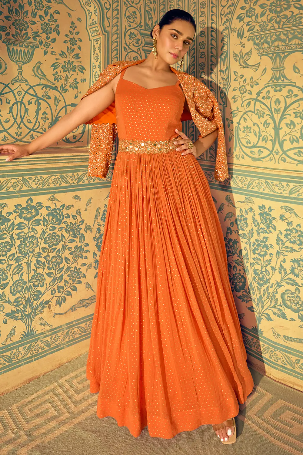Stunning full front view of the orange indowestern anarkali dress with jacket showcasing its vibrant georgette flare.