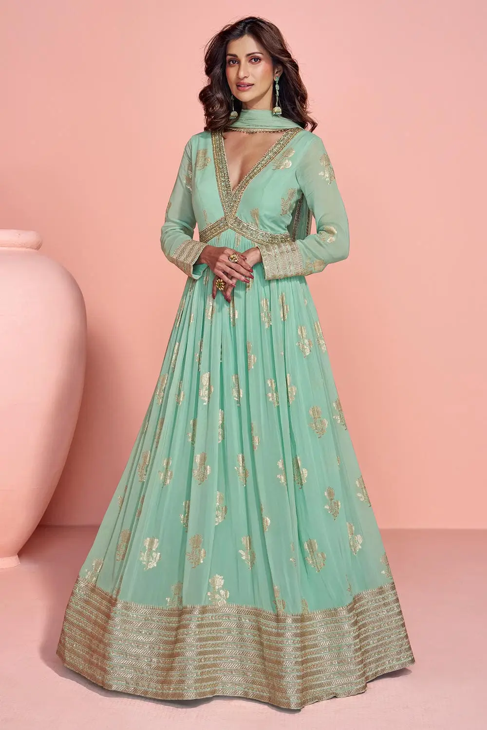 Mint green jacquard silk anarkali gown with embroidered work by Khaish