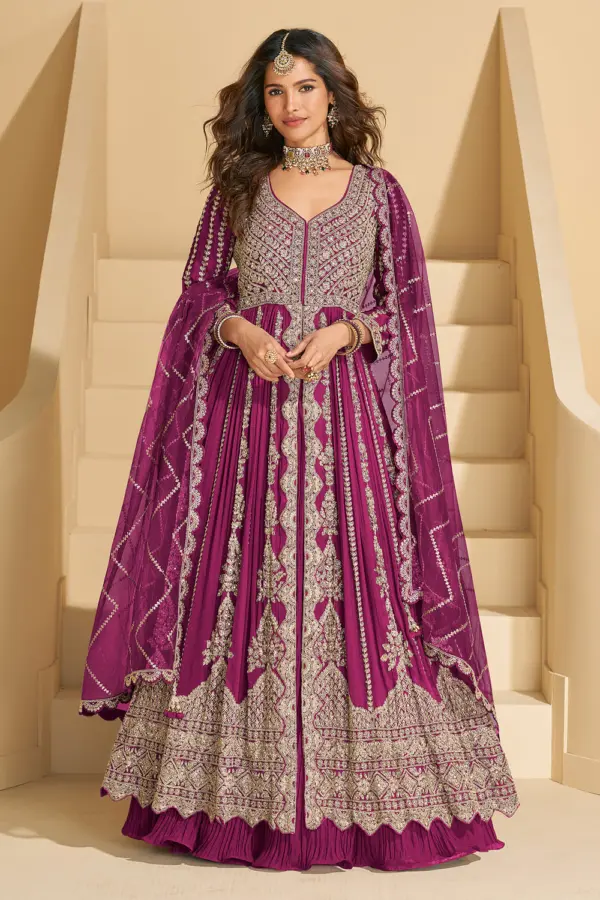 Spectacular full front view of the hot pink chinon silk anarkali with skirt featuring heavy intricate embroidery.