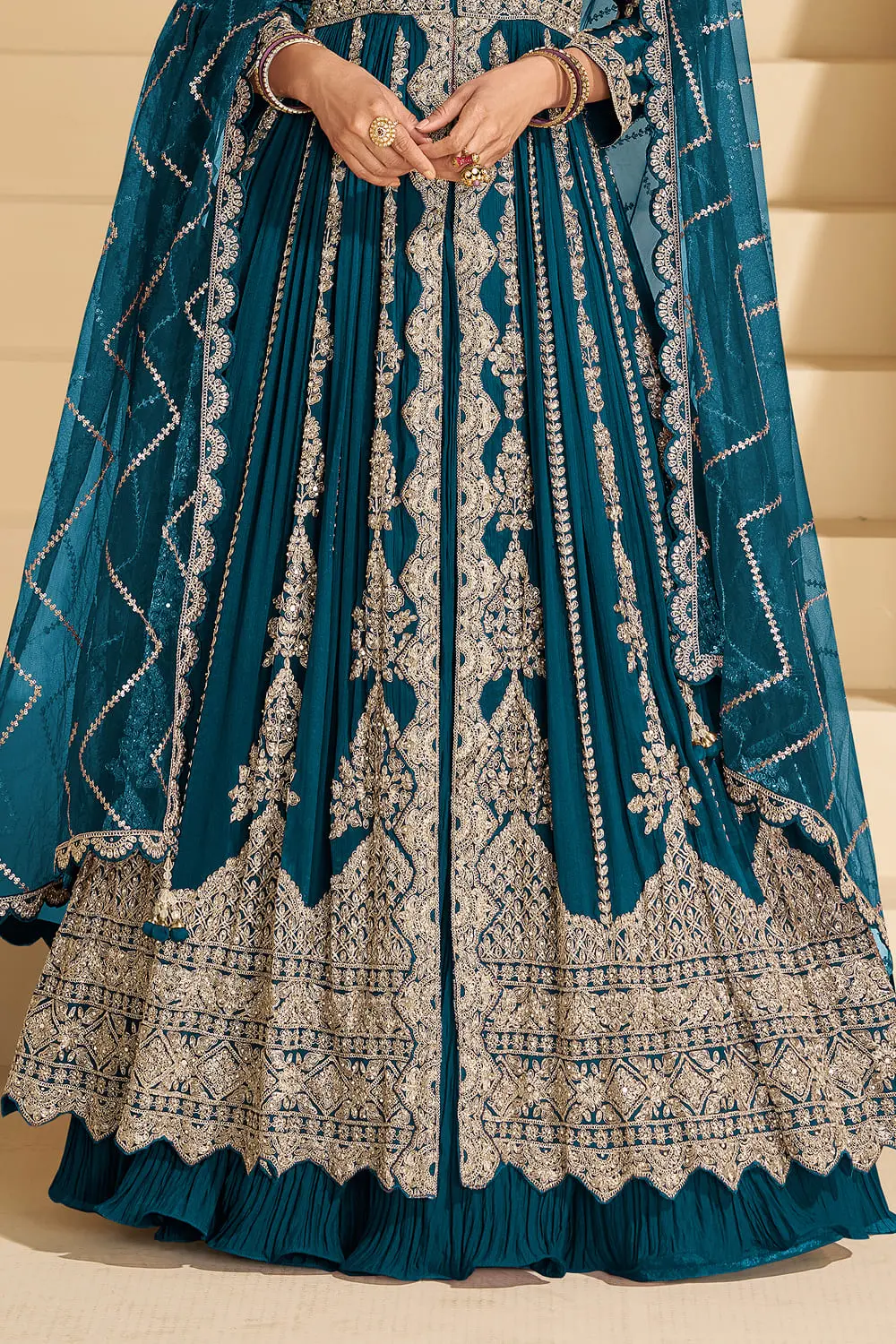 Beautiful bottom view showing the flowing premium skirt and floor-length cut of the teal blue chinon suit.