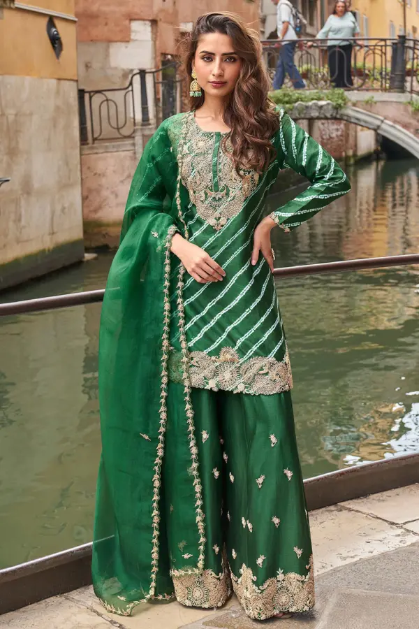 Bottle green digital silk palazzo set with embroidered top and dupatta by Khaish