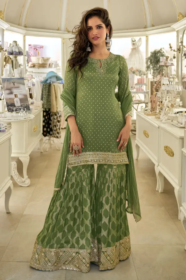Green jacquard silk sharara set with embroidered top and dupatta by Khaish