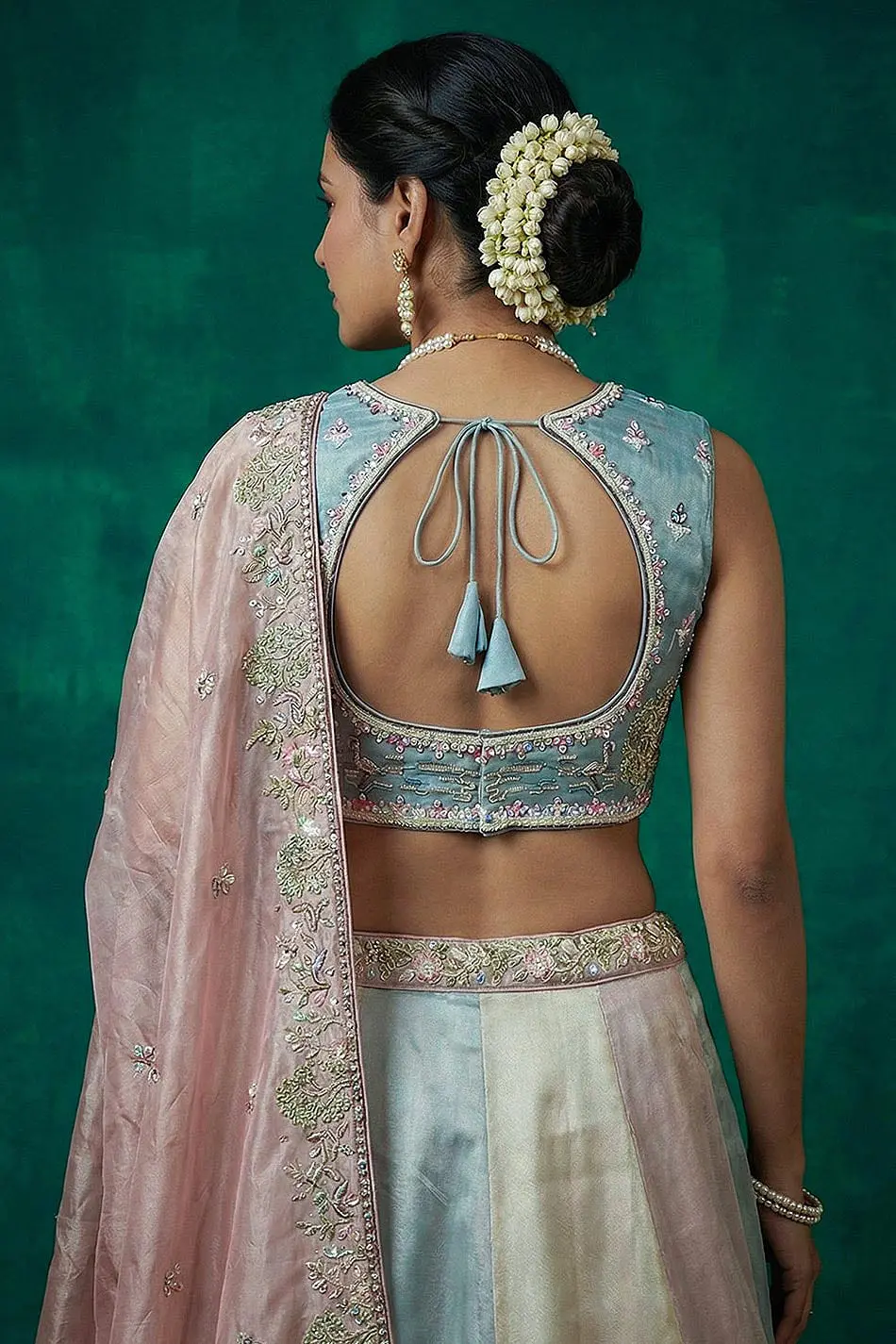 Rear of the blue blouse — sweetheart neck line and three-quarter sleeve embroidery