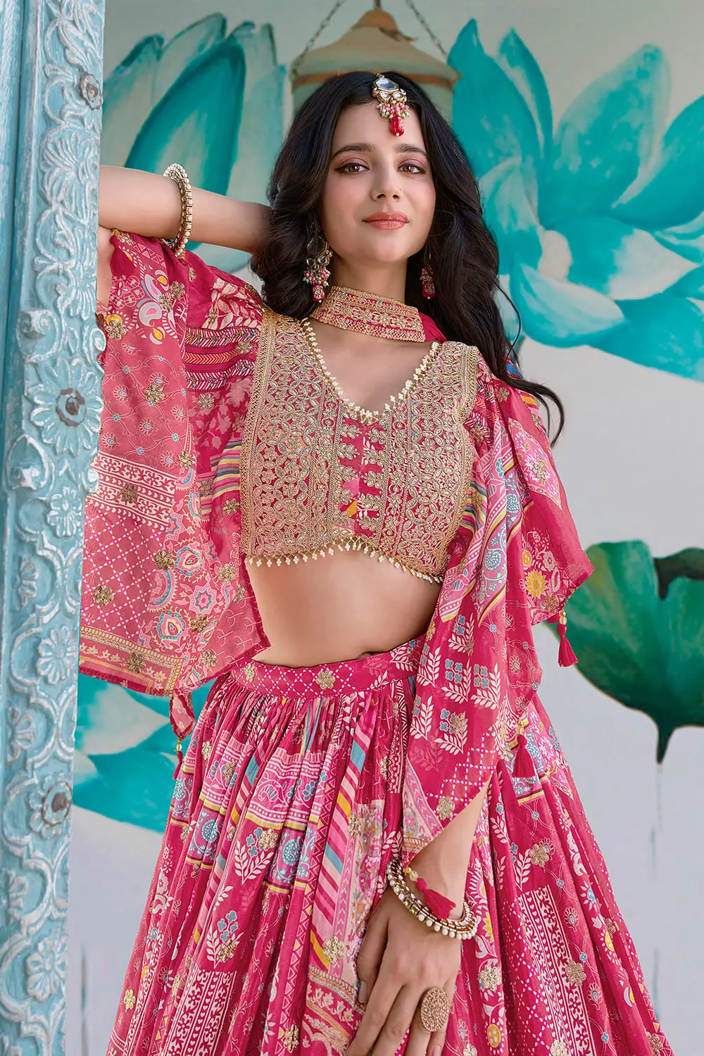 Zari dori embroidery and digital print detail on the pink chinon silk lehenga