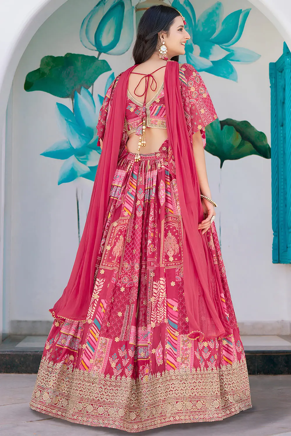 Pink lehenga from the back, flare fully visible