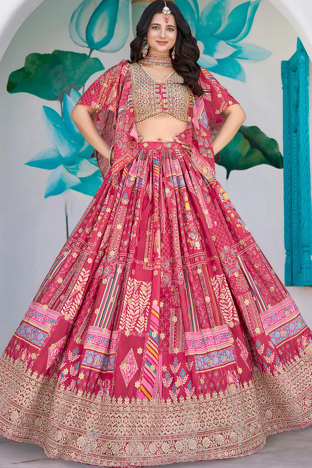 Full front view of the pink chinon silk lehenga, chiffon dupatta styled over the shoulder