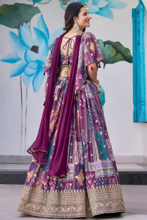 Back view of the purple lehenga, showing the fall of the flare