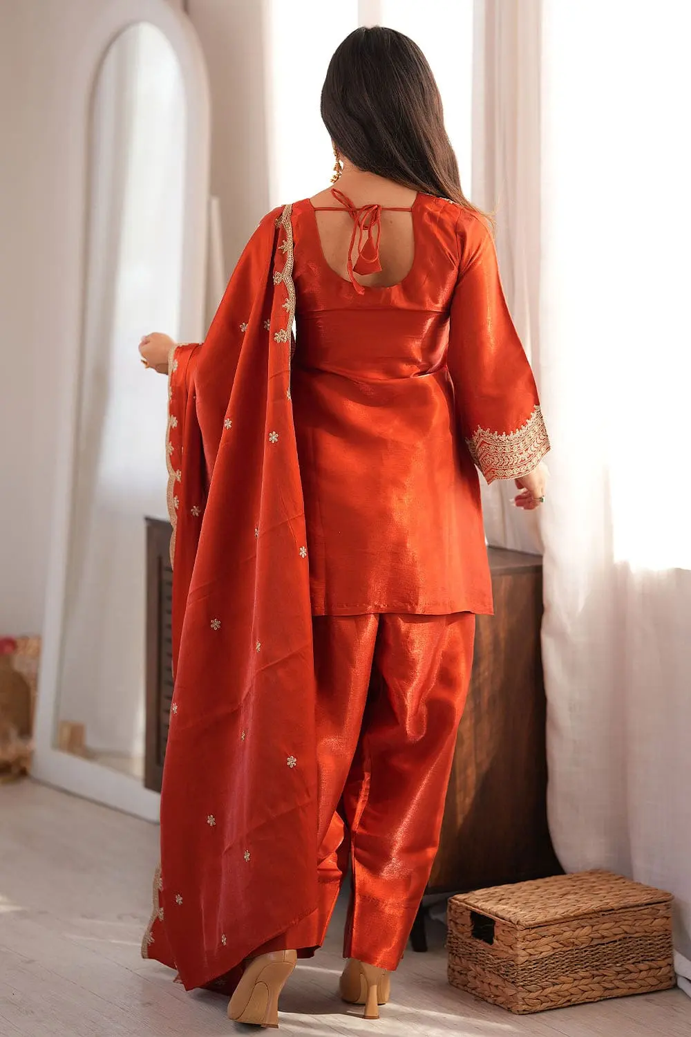 Back view of orange pakistani salwar kameez