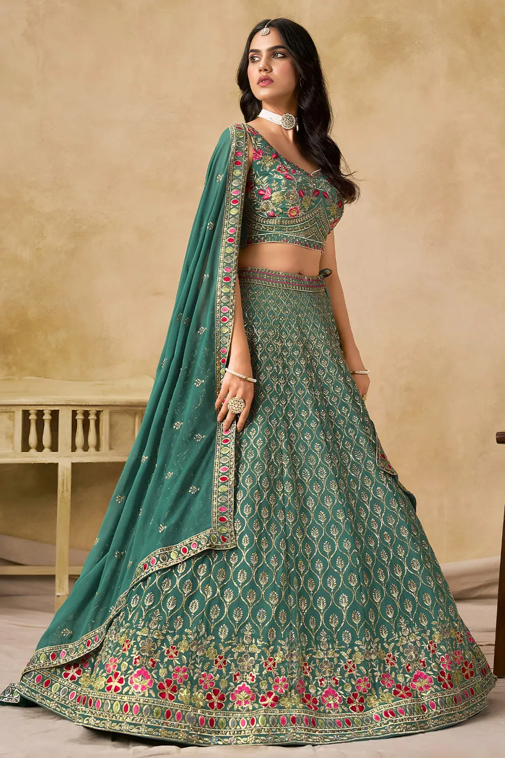 Side angle view of blue georgette lehenga with dupatta draped