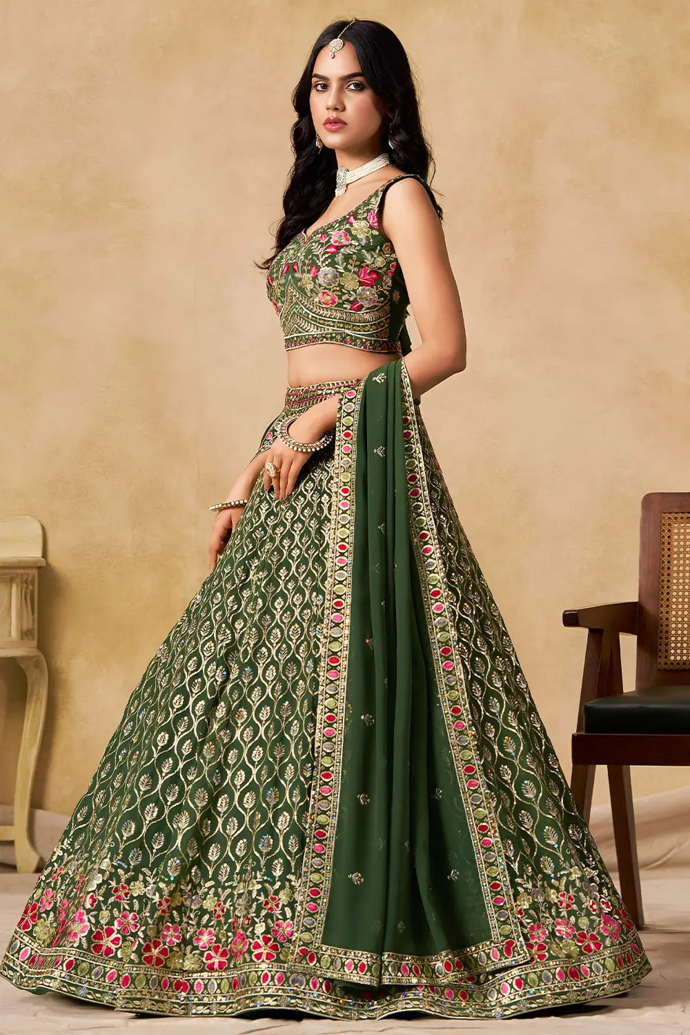 Side angle view of green georgette lehenga with dupatta draped