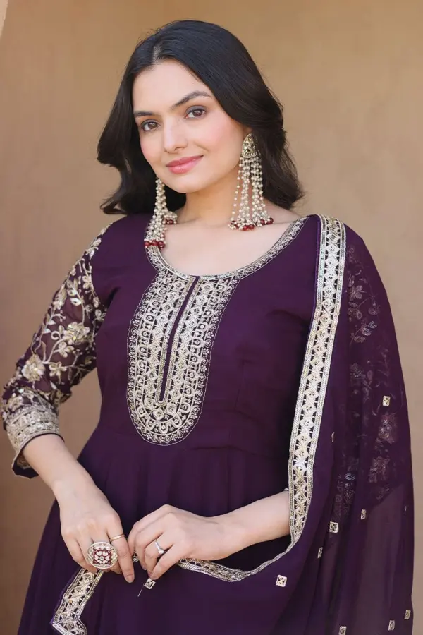 Close up of intricate zari sequins work on the deep purple anarkali set
