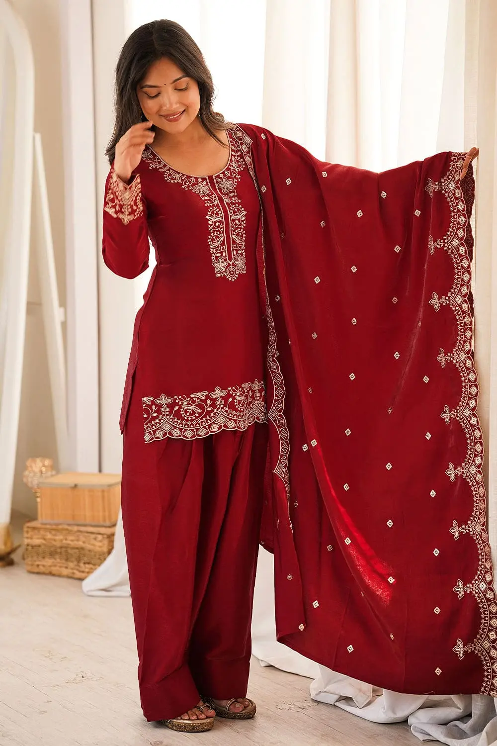 Full length front view of maroon designer silk kurta set