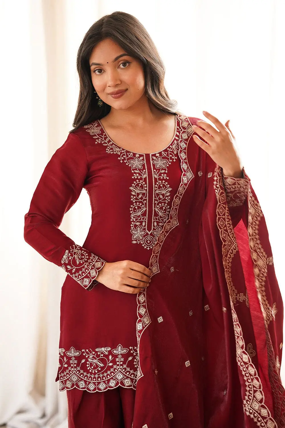 Close up embroidery of maroon designer silk kurta set