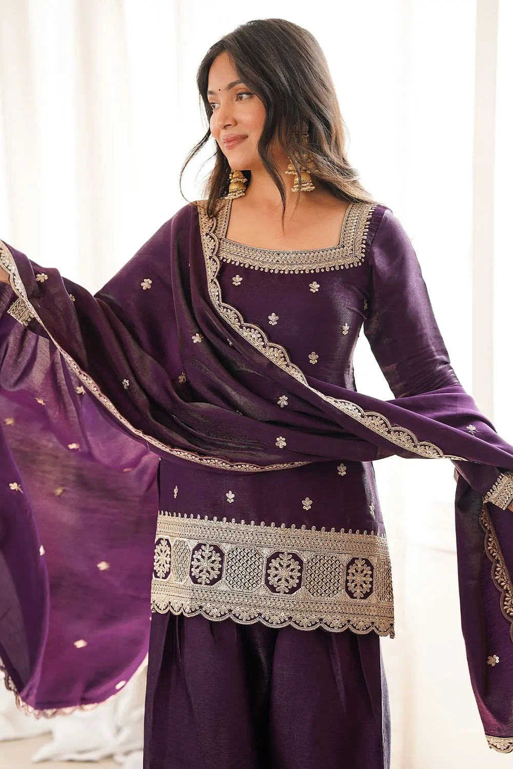 Close up zari on deep purple silk salwar kameez