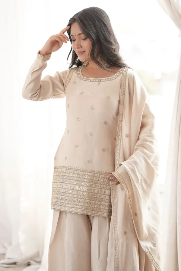 Close up sequence of off white silk salwar suit