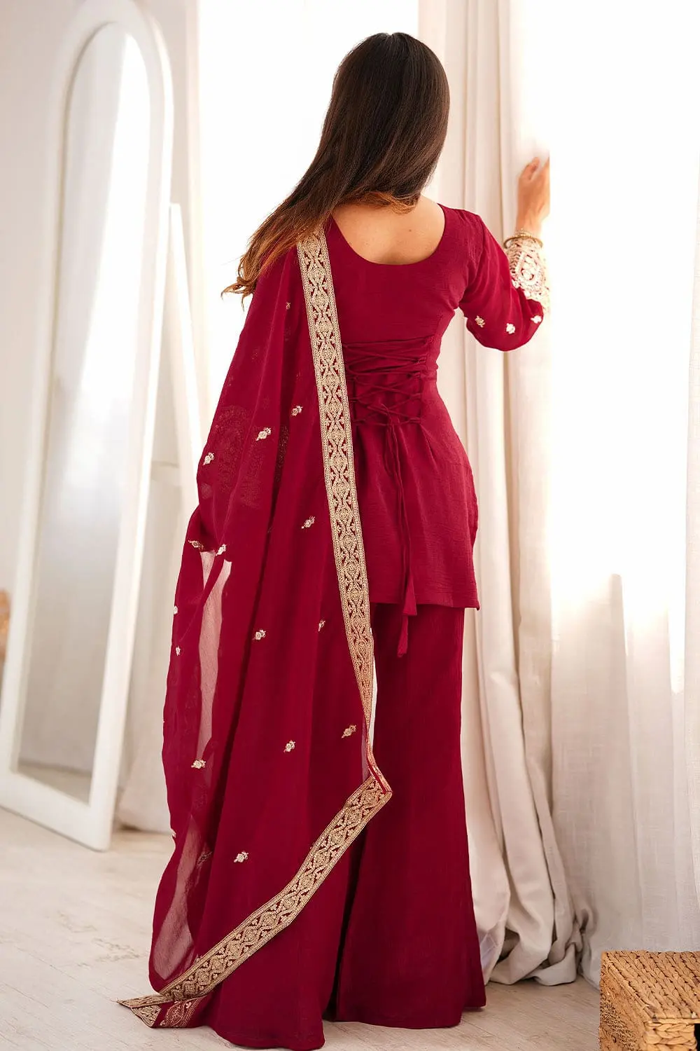 Back view design of maroon sharara set for wedding