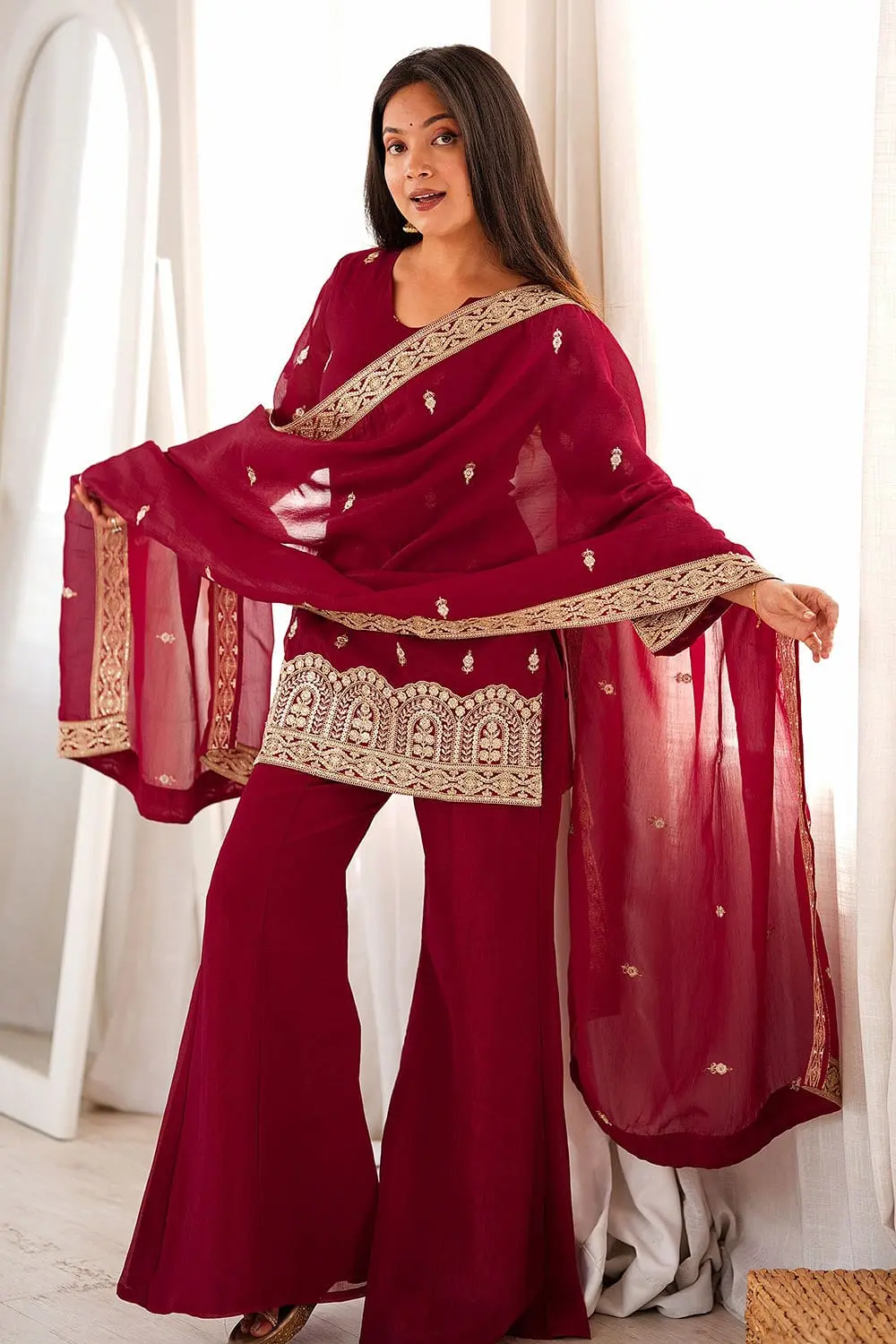 Elegant evening maroon sharara set for wedding