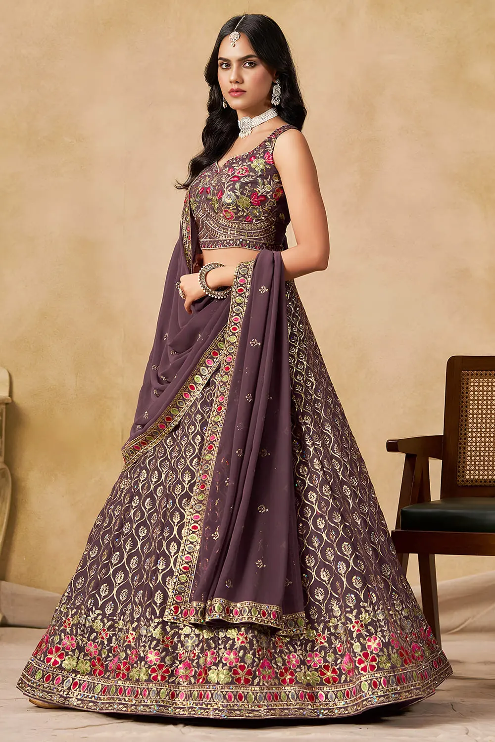 Side angle view of purple georgette lehenga with dupatta draped