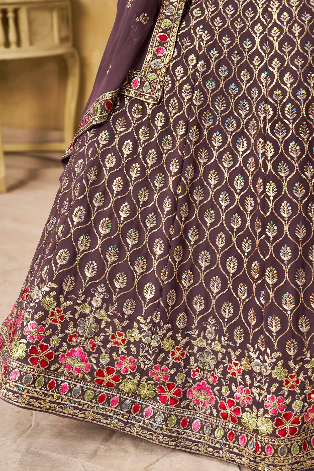 Bottom flare and embroidery design of purple georgette lehenga