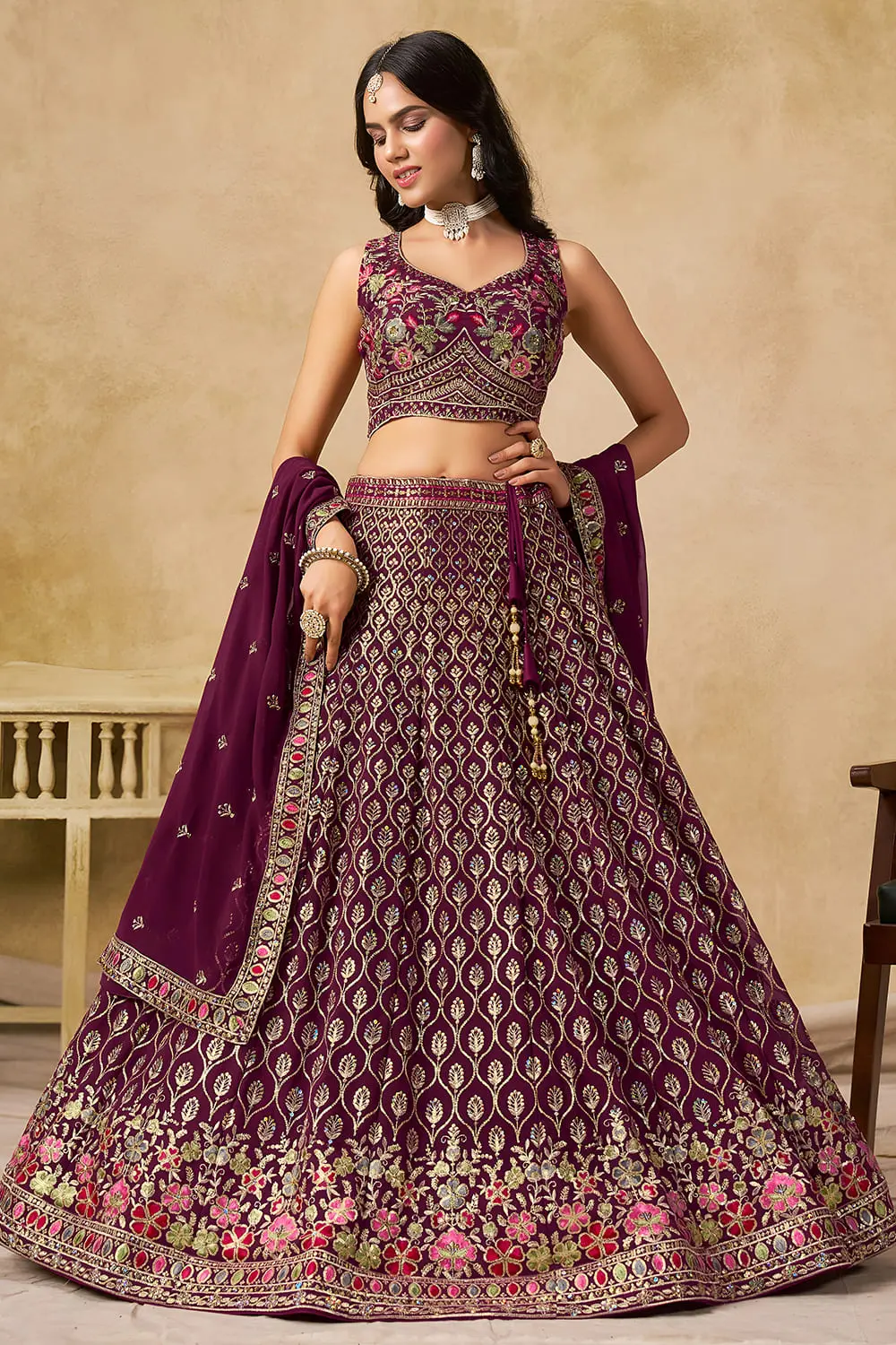 Maroon georgette lehenga for reception with sequins and thread embroidery by Khaish