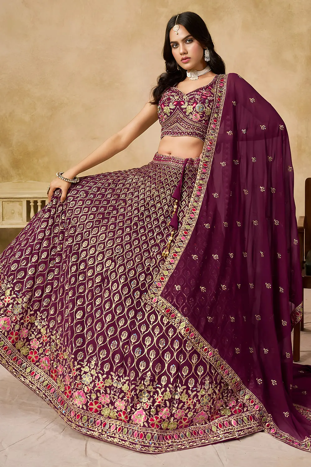 Maroon georgette lehenga with sequin work seated view