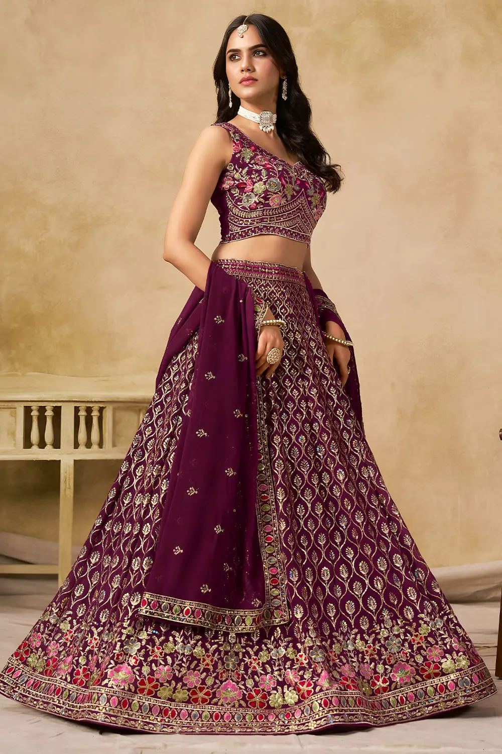 Side angle view of maroon georgette lehenga with dupatta draped