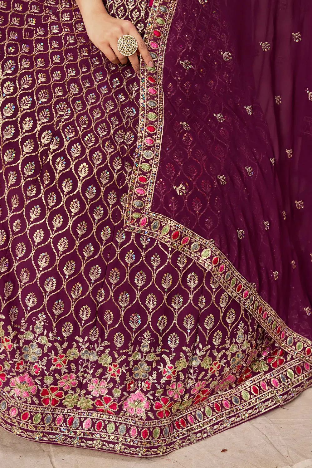 Bottom flare and embroidery design of maroon georgette lehenga