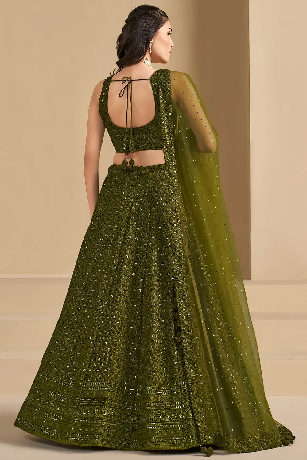 Elegant back neckline design of the olive formal ethnic wear top