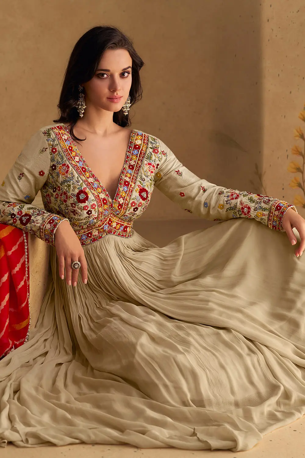 Beige georgette anarkali gown with dupatta seated view