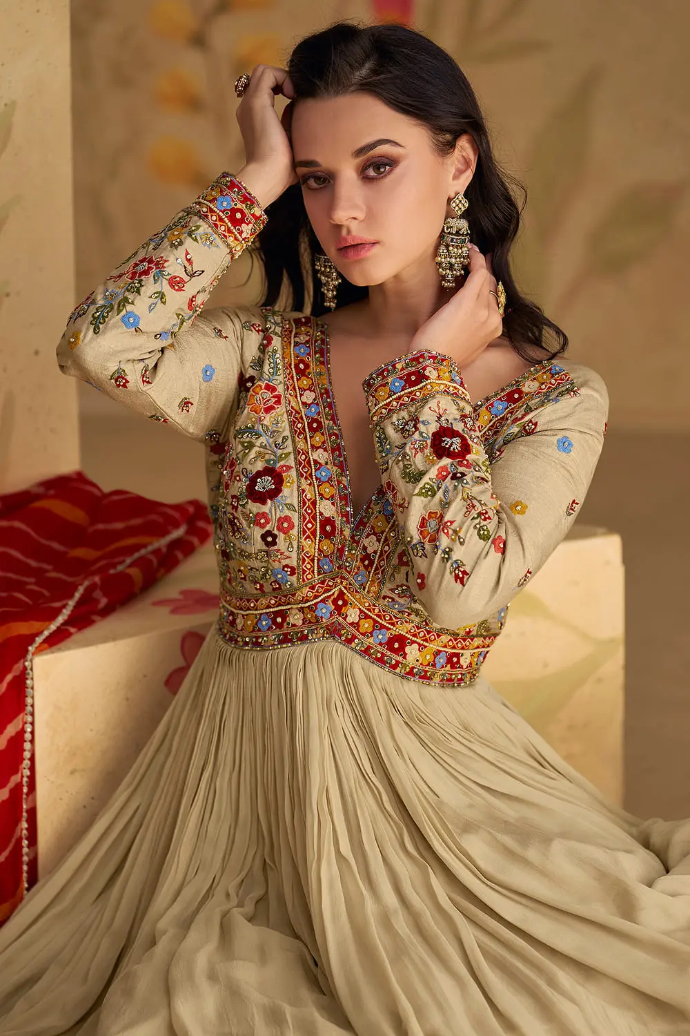 Close up of embroidery on beige georgette anarkali gown